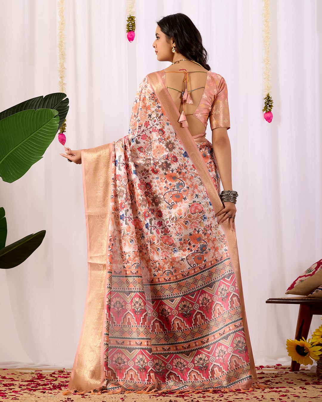 Premium Soft Lichi Silk Saree adorned with intricate floral digital weaving and luxurious golden zari border — blending timeless charm with regal grace.