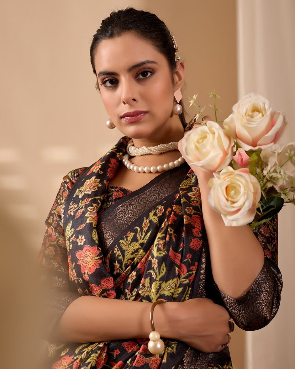 Exquisite Soft Lichi Silk Saree featuring stunning digital floral motifs on a rich black base, beautifully complemented by a luxurious golden zari border.