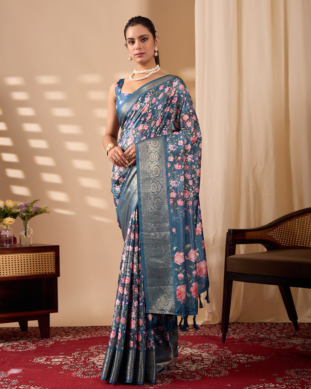 Gorgeous Soft Lichi Silk Saree in Deep Teal Blue, adorned with Romantic Rose Floral Digital Prints and finished with an Intricately Woven Golden Zari Border — perfect for festive gatherings, elegant evenings, or special celebrations.
