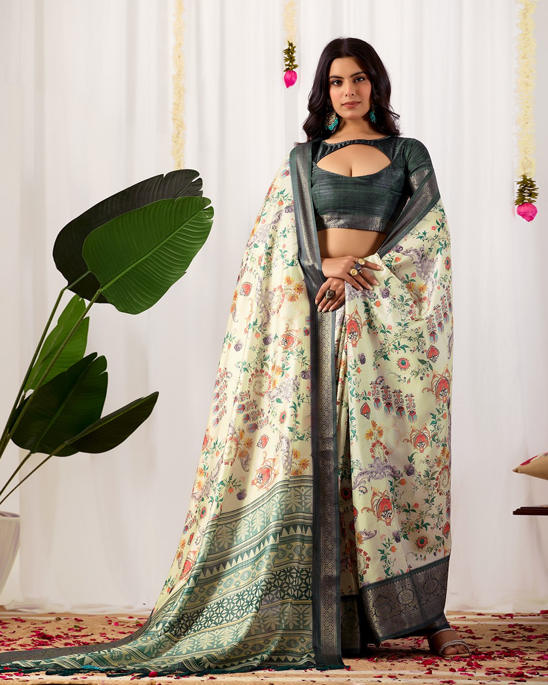 Premium Soft Lichi Silk Saree adorned with vibrant digital floral prints, complemented by a rich, intricately woven zari border — a perfect blend of luxury and tradition.