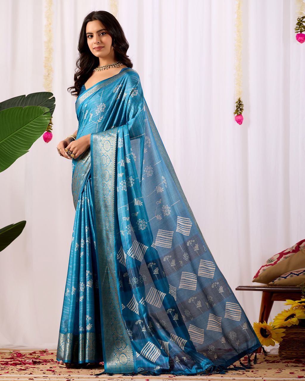 Premium Soft Lichi Silk Saree highlighted with graceful silver zari weaving and intricate ethnic motifs — radiating sheer elegance and royal charm in every drape.