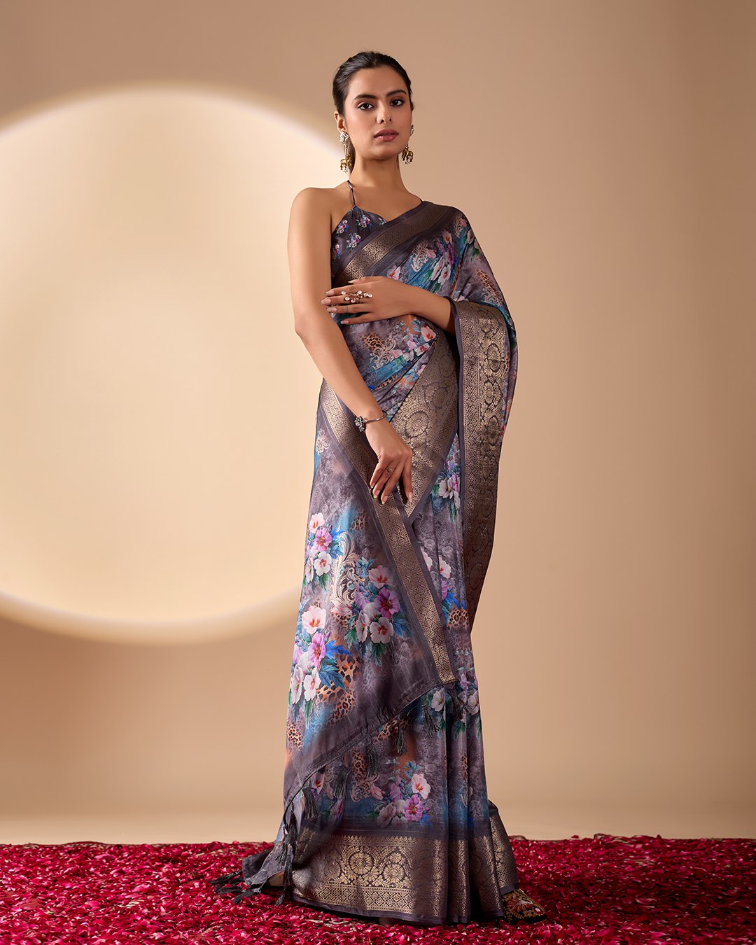Gorgeous Soft Lichi Silk Saree featuring enchanting digital floral prints on a rich smoky grey base with an intricate golden zari border.