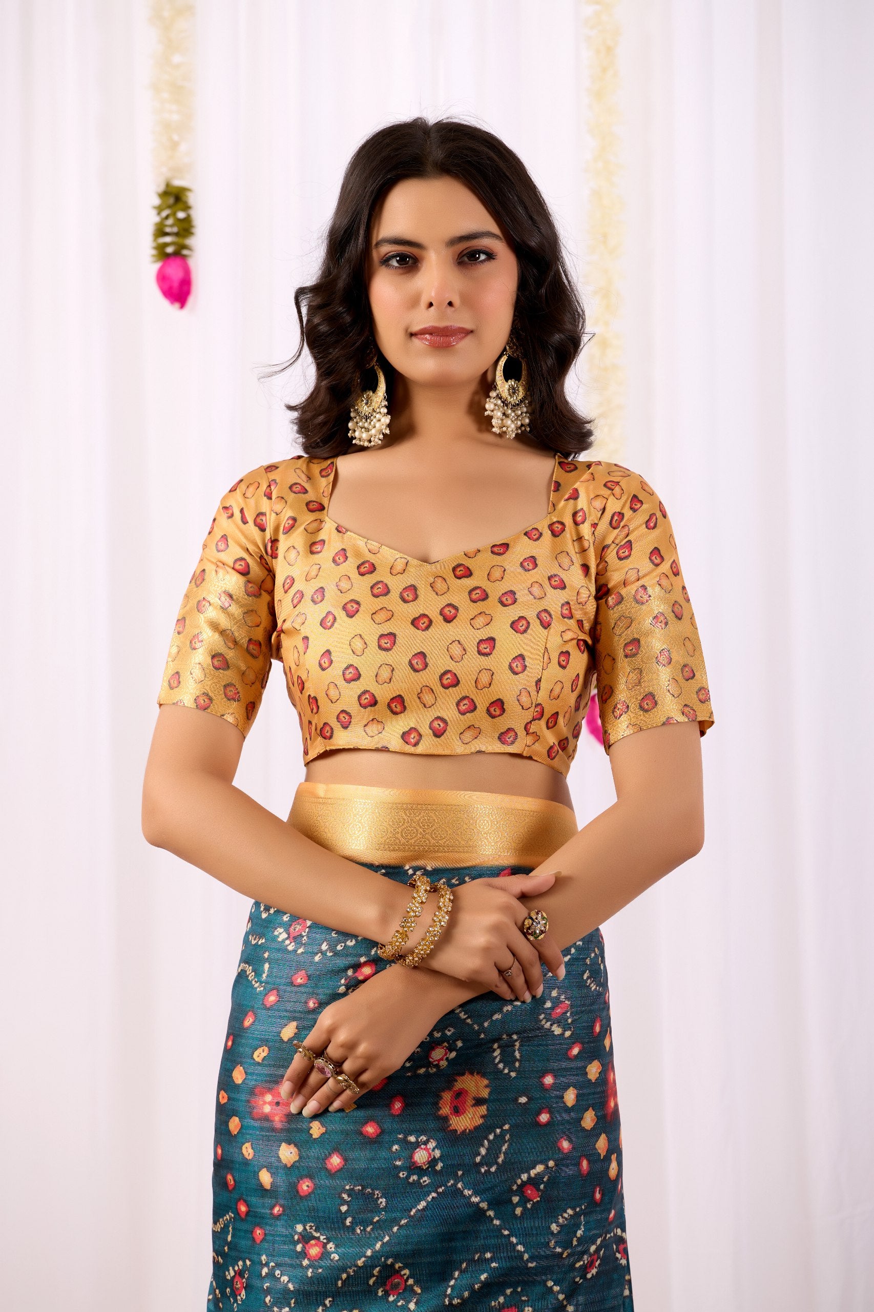 Soft Lichi Silk Saree featuring an Elegant Tribal Art Print complemented by a Luxurious Rich Zari Border. The blend of traditional artistry and silky sheen adds a royal touch to your festive look.