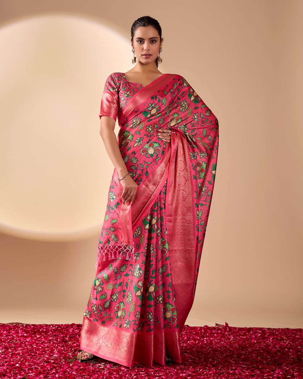 oft Lichi Silk Saree enriched with vibrant floral digital prints and a beautifully woven zari border.