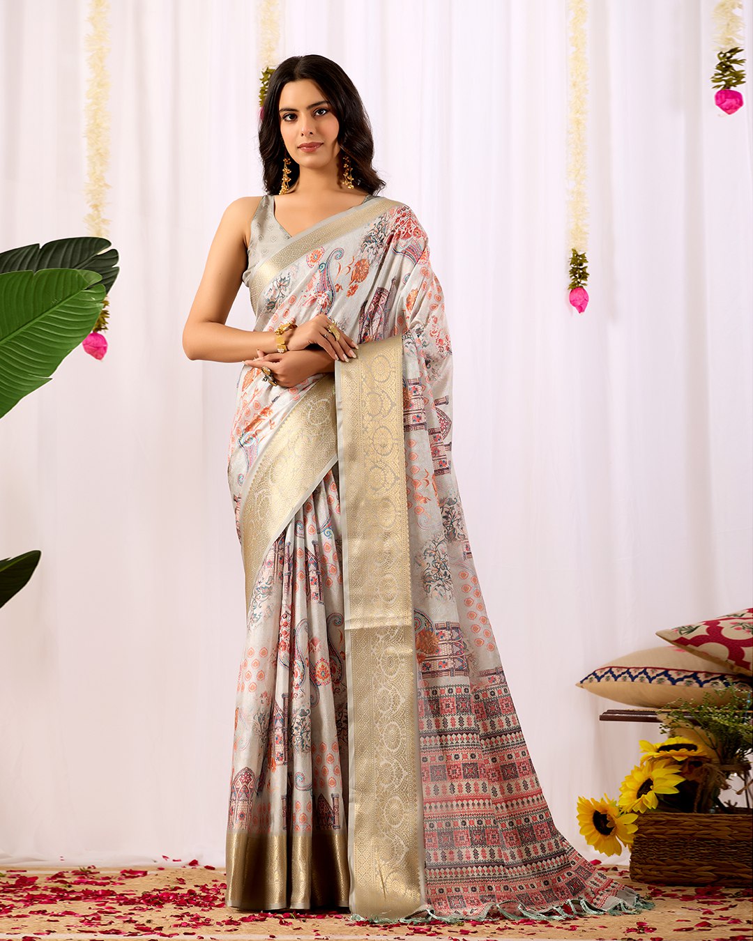 Elegant Soft Lichi Silk Saree featuring royal ethnic motifs with a lavish golden zari woven border, bringing together rich heritage and modern sophistication.