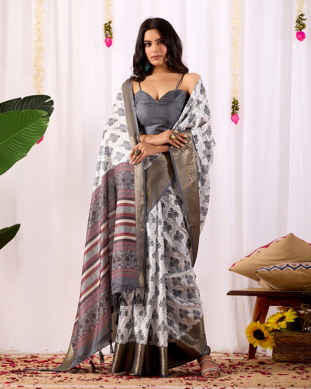 Premium Soft Lichi Silk Saree in Elegant White Base featuring intricate black ethnic motifs, beautifully complemented with a luxurious golden zari woven border and a rich maroon pallu