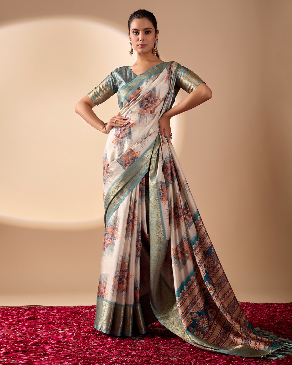 Elegant Soft Lichi Silk Saree in a refined ivory and teal tone, featuring traditional motifs and intricate digital prints enhanced with a golden zari border.