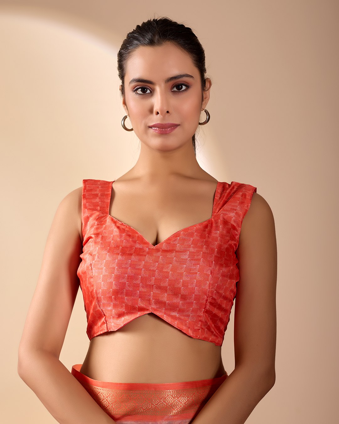 Soft Lichi Silk Saree adorned with elegant floral patterns and intricate Patola-inspired pallu, complemented by a luxurious zari woven border