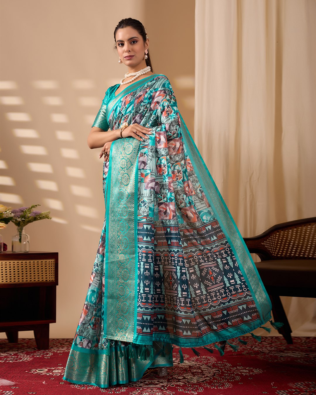Premium Soft Lichi Silk Saree in Elegant Sea Green Shade, adorned with Artistic Abstract & Floral Digital Prints and enriched with a Luxurious Golden Zari Woven Border — a perfect blend of tradition and trend for festive & party occasions.