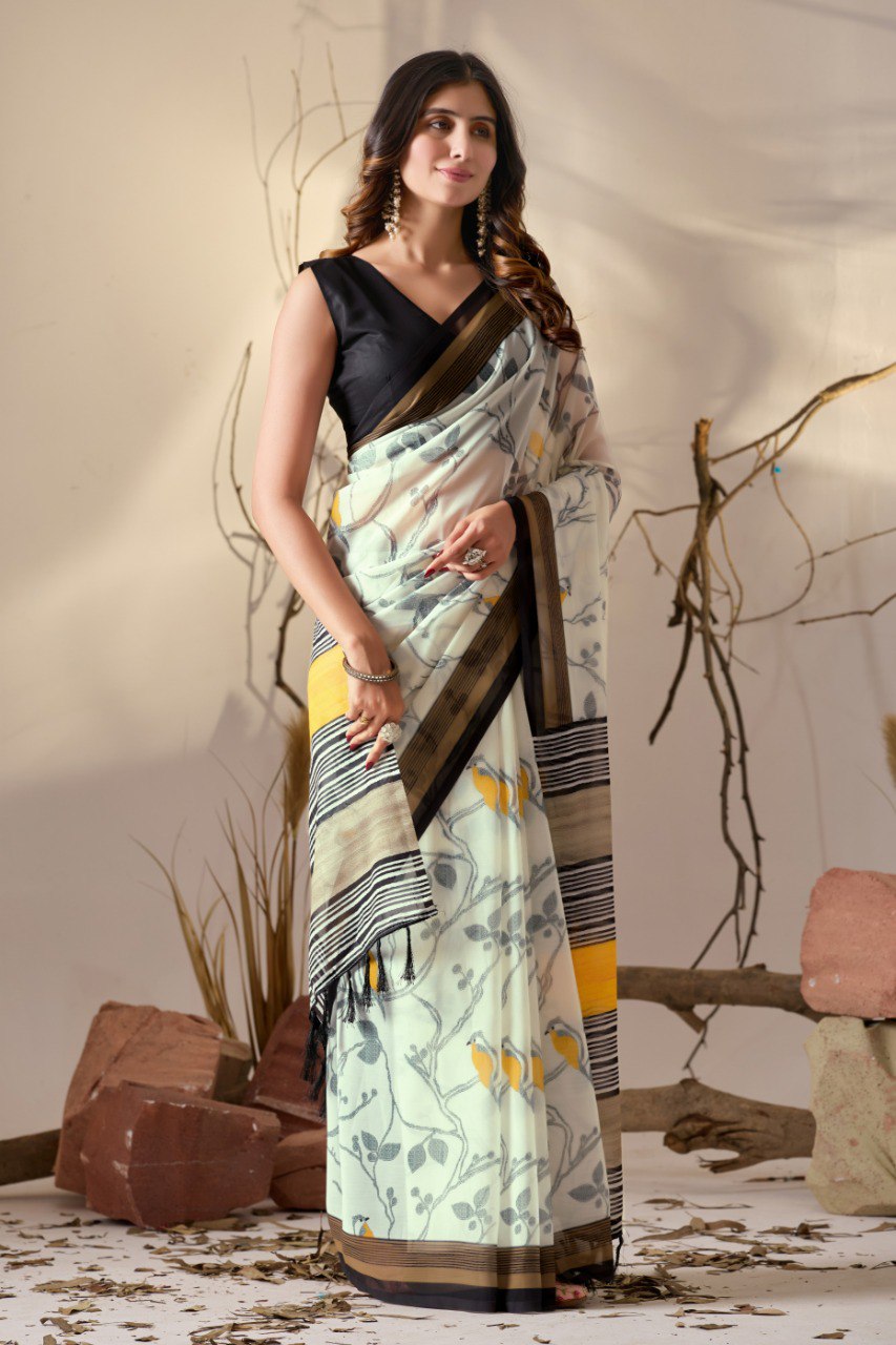 Soft Georgette Lightweight Saree with Delicate Cream Base, Adorned with Subtle Bird & Branch Motifs and Finished with Bold Mustard-Yellow & Black Striped Digital Print Border and Pallu with Elegant Tassel Detailing