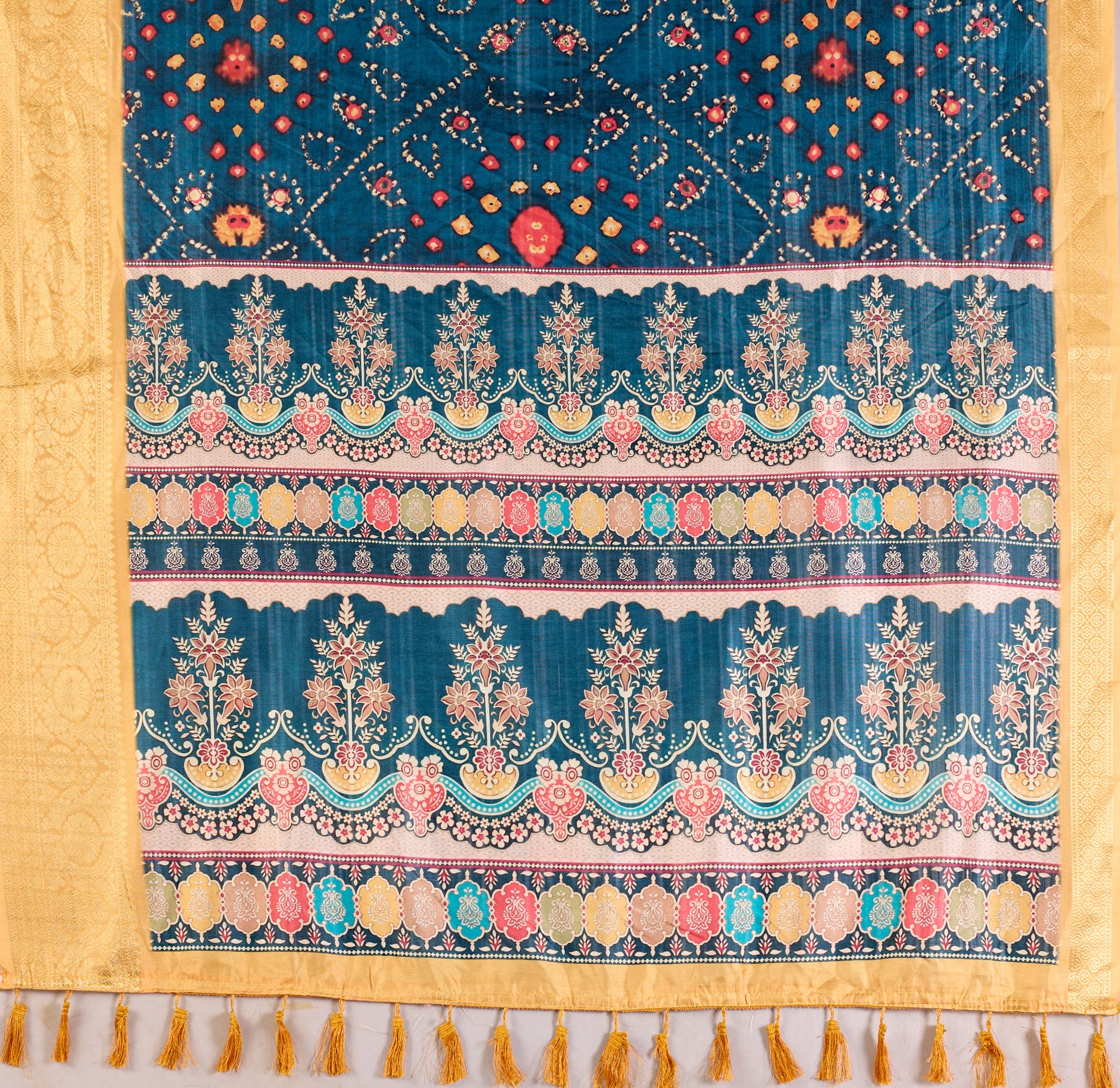 Soft Lichi Silk Saree featuring an Elegant Tribal Art Print complemented by a Luxurious Rich Zari Border. The blend of traditional artistry and silky sheen adds a royal touch to your festive look.