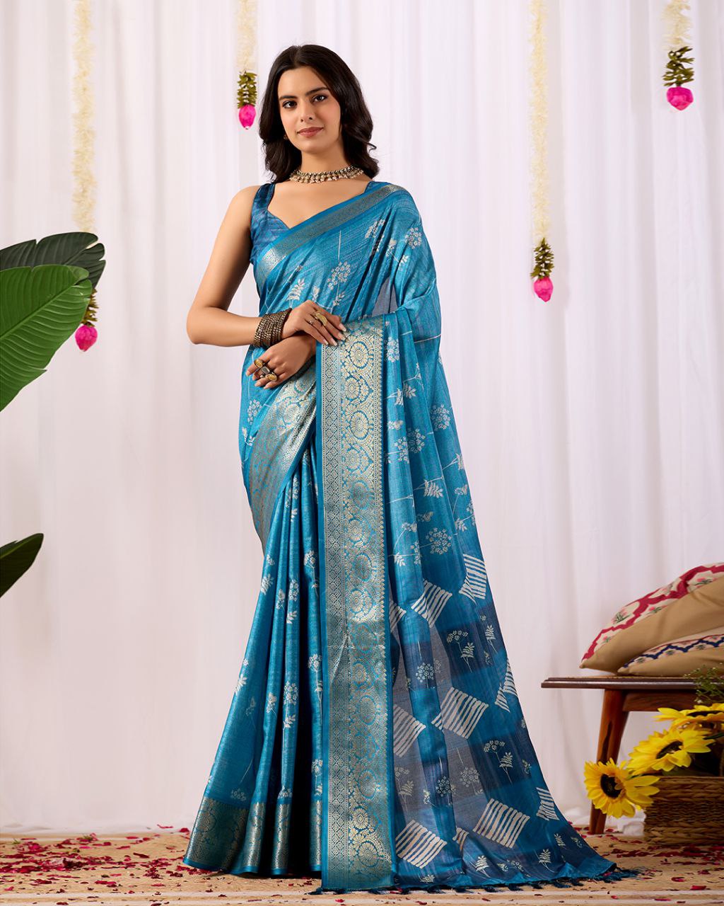 Premium Soft Lichi Silk Saree highlighted with graceful silver zari weaving and intricate ethnic motifs — radiating sheer elegance and royal charm in every drape.