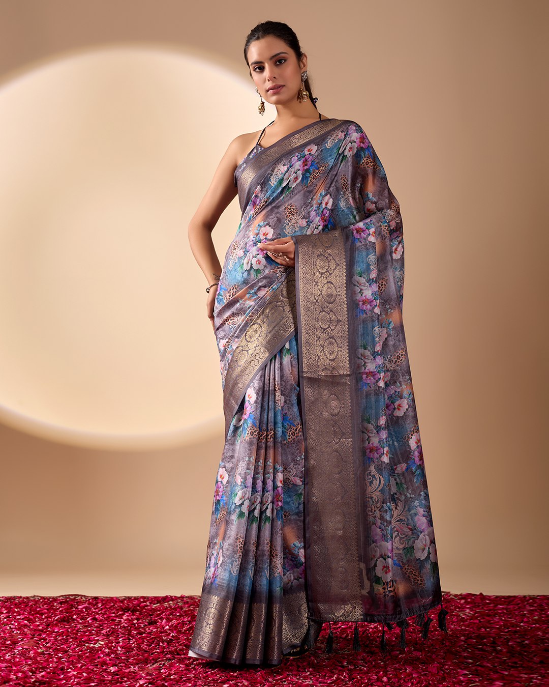 Gorgeous Soft Lichi Silk Saree featuring enchanting digital floral prints on a rich smoky grey base with an intricate golden zari border.