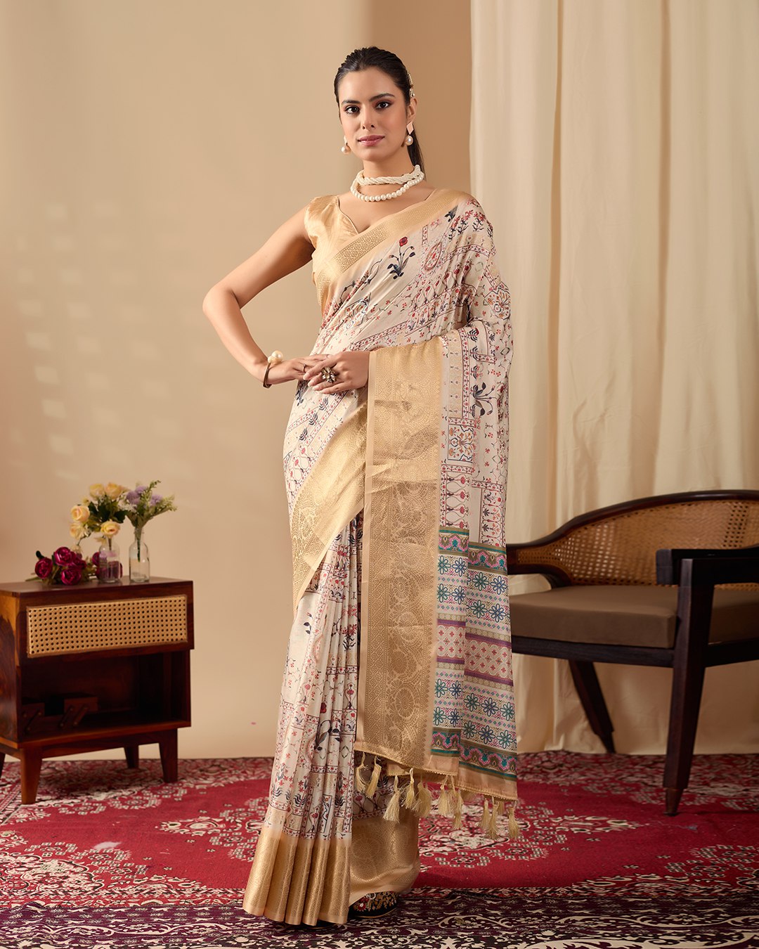Soft Lichi Silk Saree adorned with graceful ethnic digital prints and complemented by a luxurious golden zari woven border