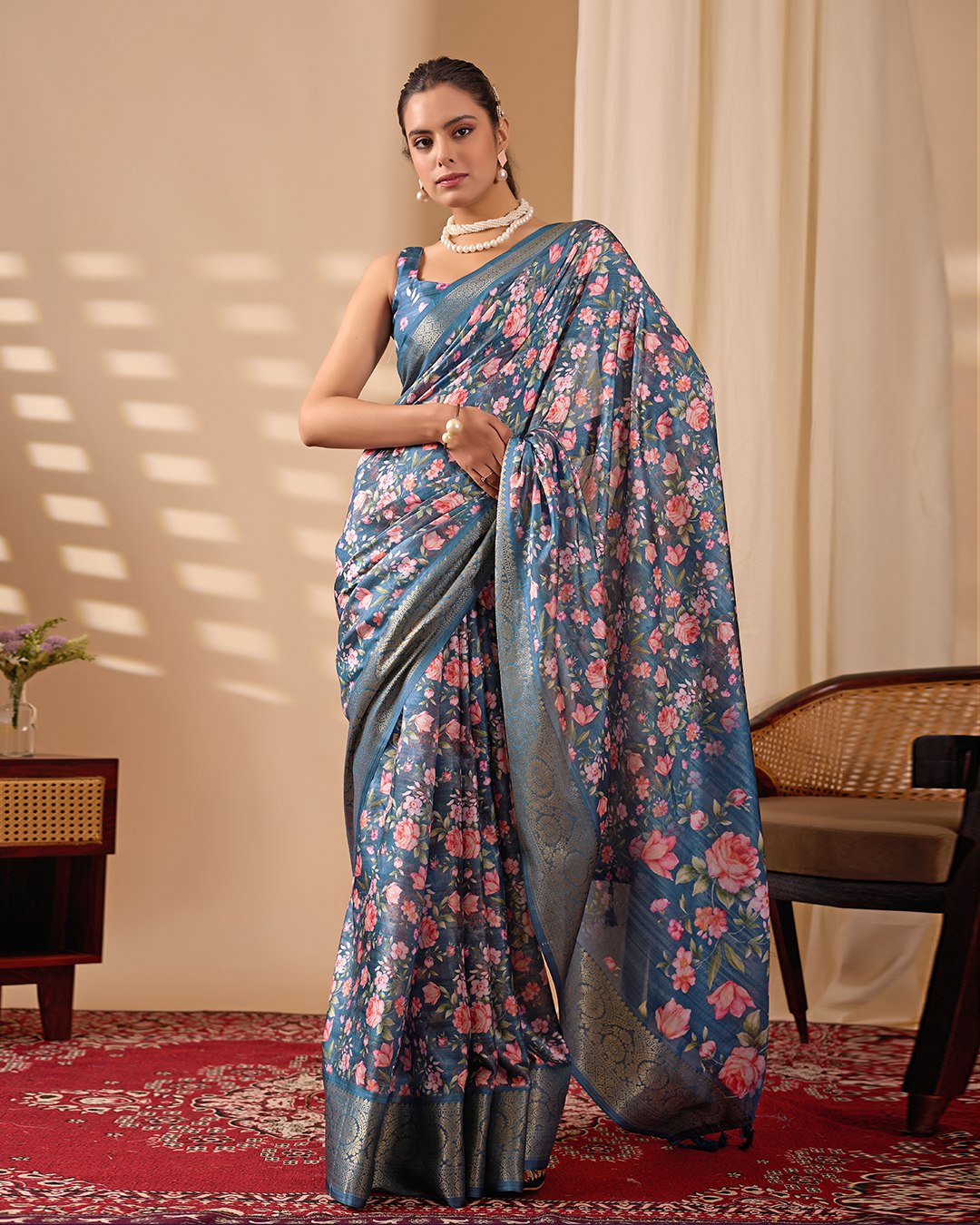 Gorgeous Soft Lichi Silk Saree in Deep Teal Blue, adorned with Romantic Rose Floral Digital Prints and finished with an Intricately Woven Golden Zari Border — perfect for festive gatherings, elegant evenings, or special celebrations.