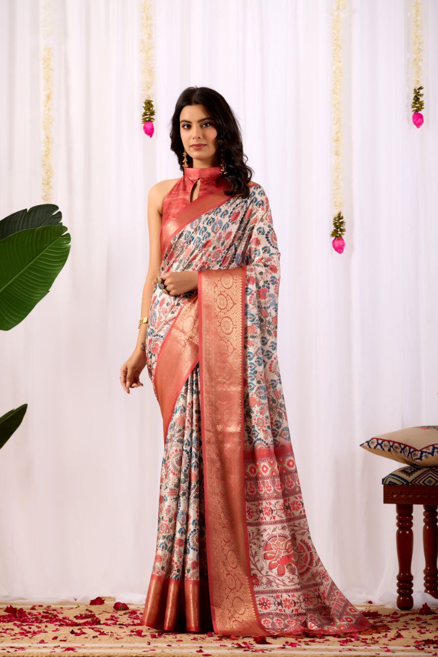 Premium Soft Lichi Silk Saree with elegant Patola-inspired geometric prints beautifully crafted with a luxurious zari woven border.