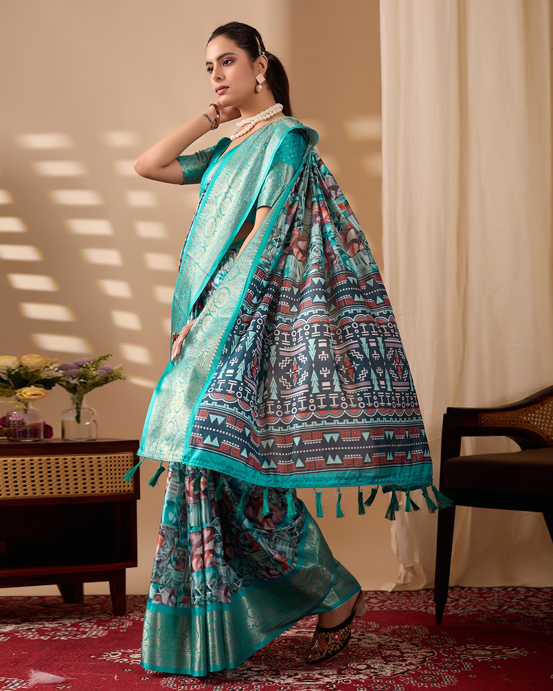 Premium Soft Lichi Silk Saree in Elegant Sea Green Shade, adorned with Artistic Abstract & Floral Digital Prints and enriched with a Luxurious Golden Zari Woven Border — a perfect blend of tradition and trend for festive & party occasions.
