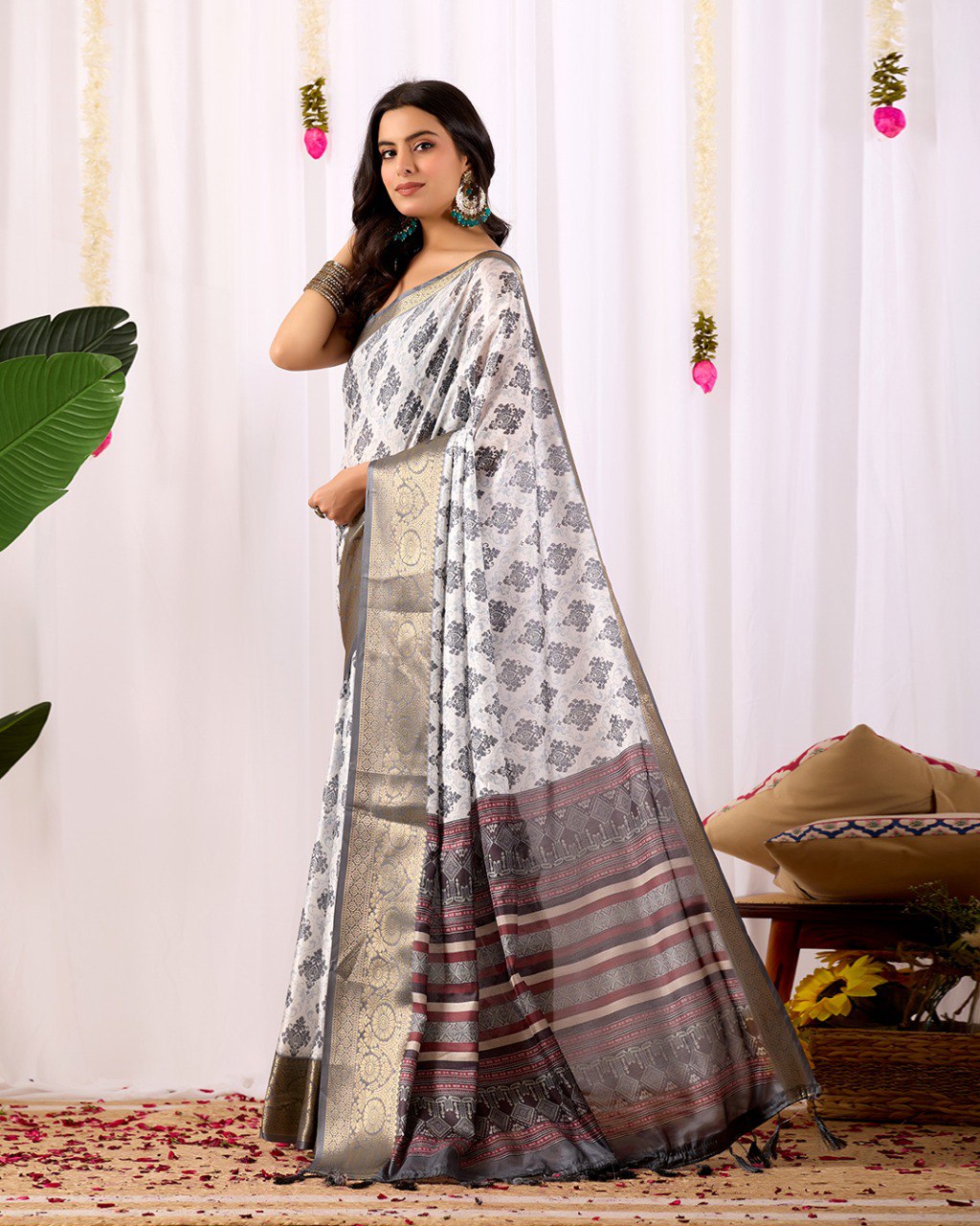 Premium Soft Lichi Silk Saree in Elegant White Base featuring intricate black ethnic motifs, beautifully complemented with a luxurious golden zari woven border and a rich maroon pallu