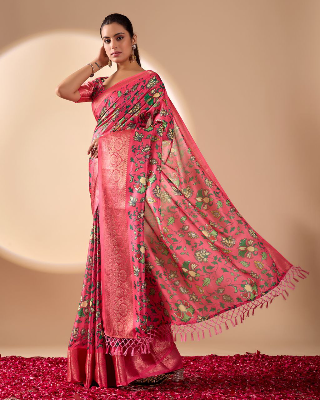 oft Lichi Silk Saree enriched with vibrant floral digital prints and a beautifully woven zari border.