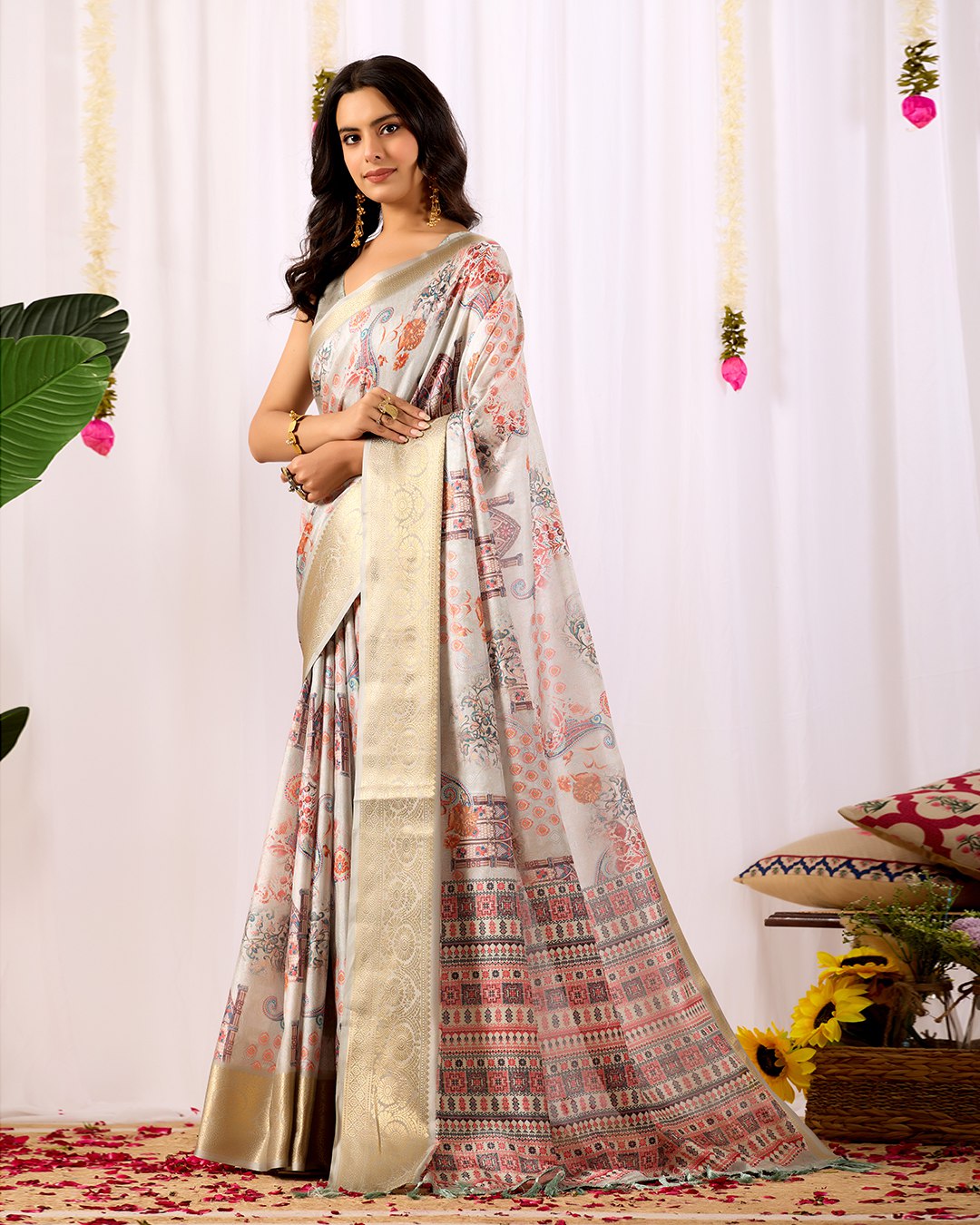 Elegant Soft Lichi Silk Saree featuring royal ethnic motifs with a lavish golden zari woven border, bringing together rich heritage and modern sophistication.