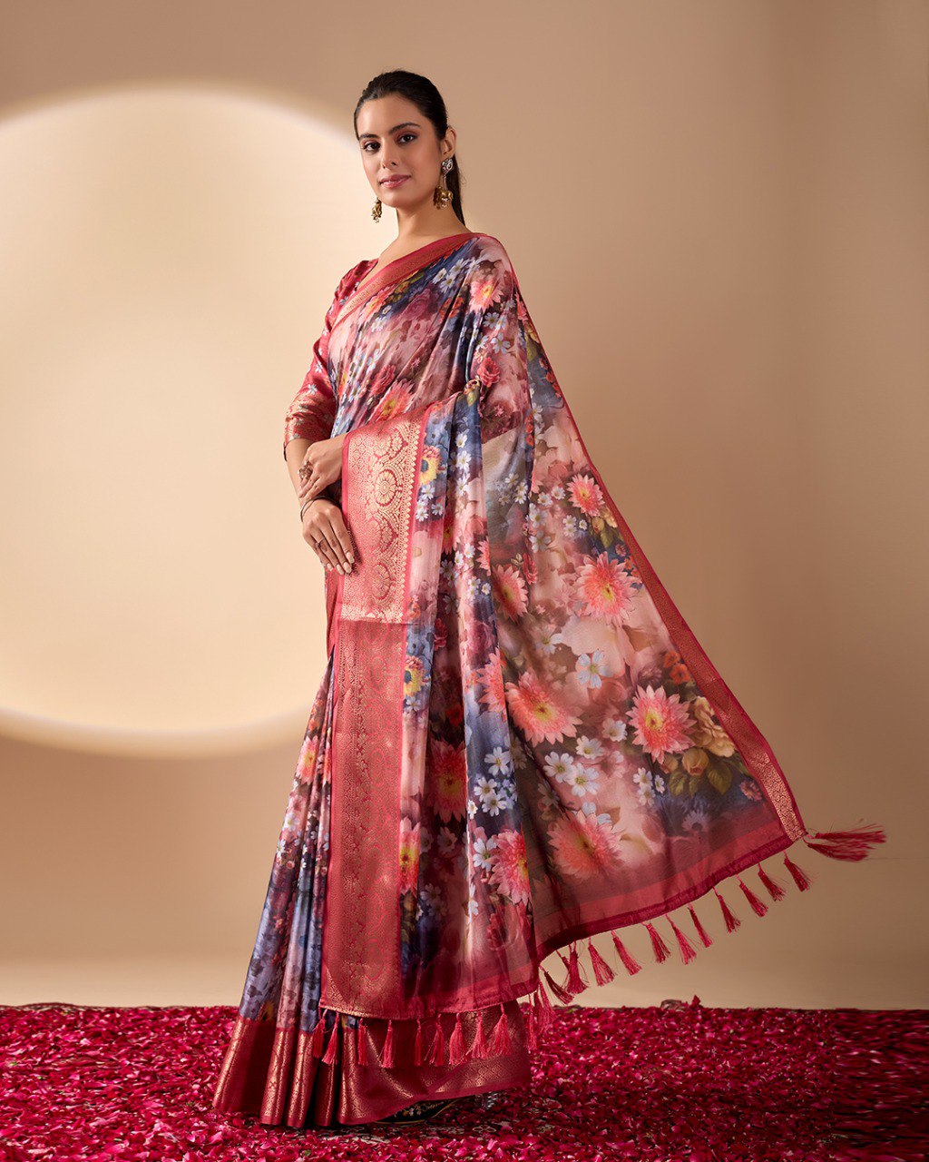 Luxurious Soft Lichi Silk Saree in Deep Wine Rose Shade featuring enchanting floral digital prints and complemented by a rich woven zari border & pallu — an epitome of elegance, beauty, and sophistication.
