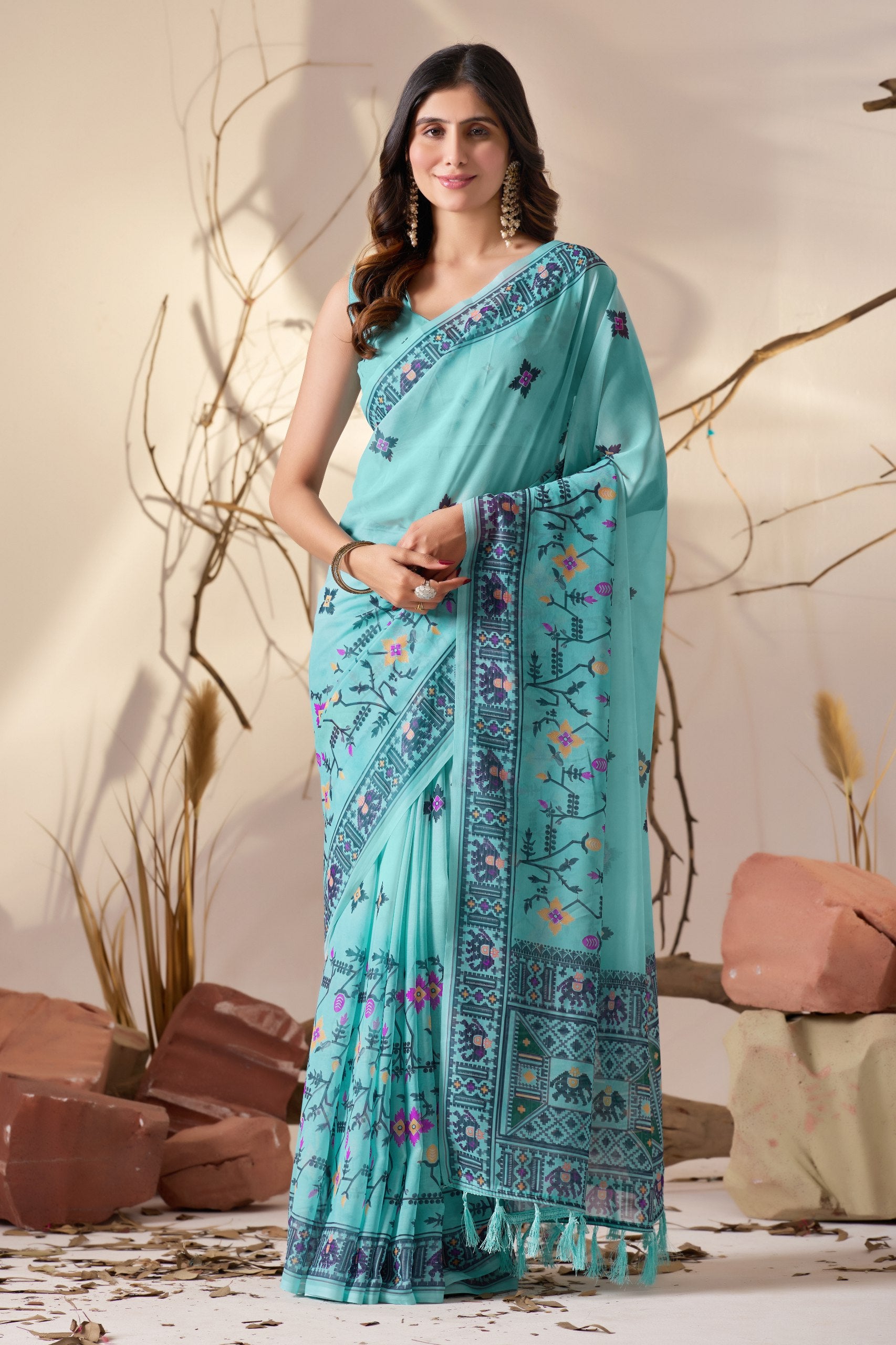 Soft Georgette Saree in Refreshing Sea Green Tone Highlighted with Intricate Digital Tribal & Floral Print, Featuring Artistic Elephant & Geometric Motifs with Elegant Tassel Detailing on Pallu