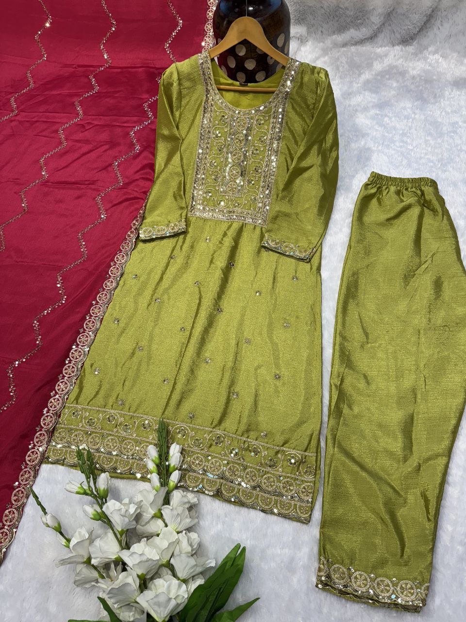NEW  colour 3-pair Suit Set you've described seems to be a party wear outfit made from have pure chinon  fabric with  sequence  embroidery work .(3-Pair)