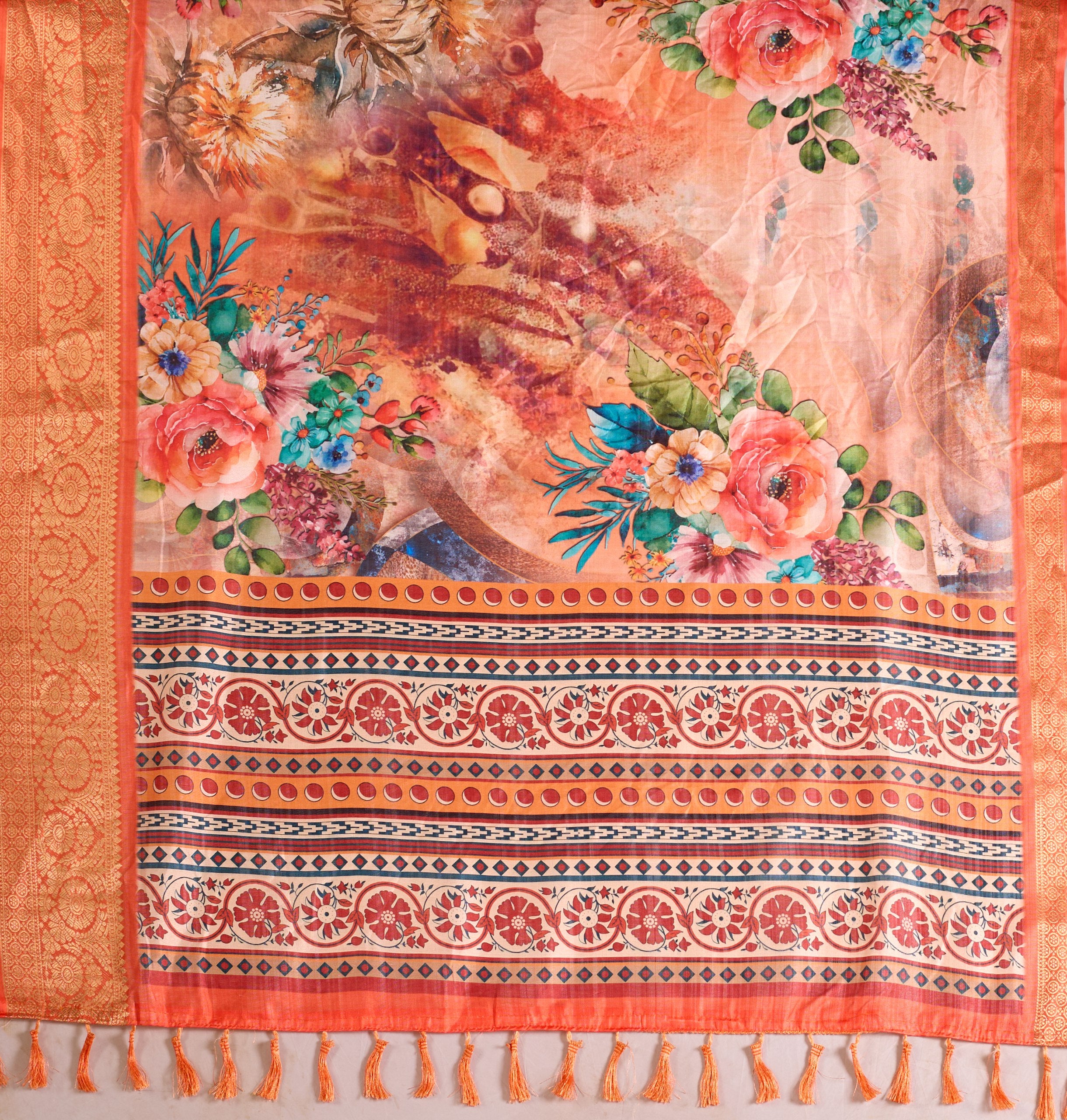 Soft Lichi Silk Saree adorned with elegant floral patterns and intricate Patola-inspired pallu, complemented by a luxurious zari woven border