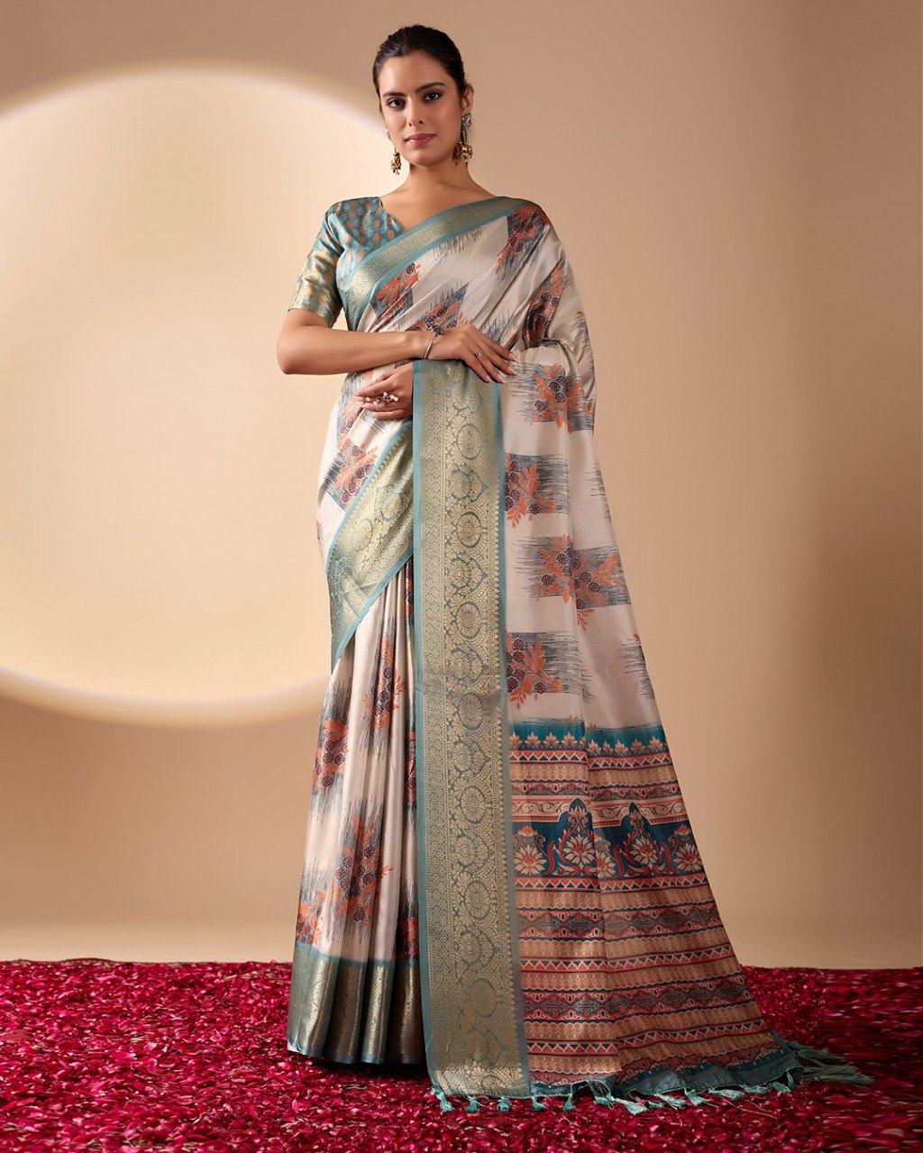Elegant Soft Lichi Silk Saree in a refined ivory and teal tone, featuring traditional motifs and intricate digital prints enhanced with a golden zari border.