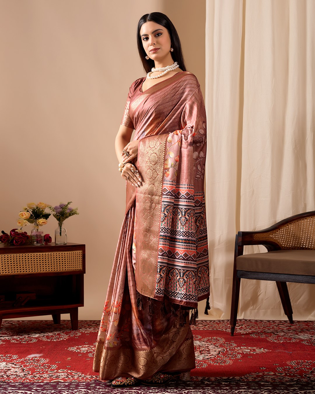 Soft Lichi Silk Saree adorned with graceful Patola-inspired motifs and a rich woven border