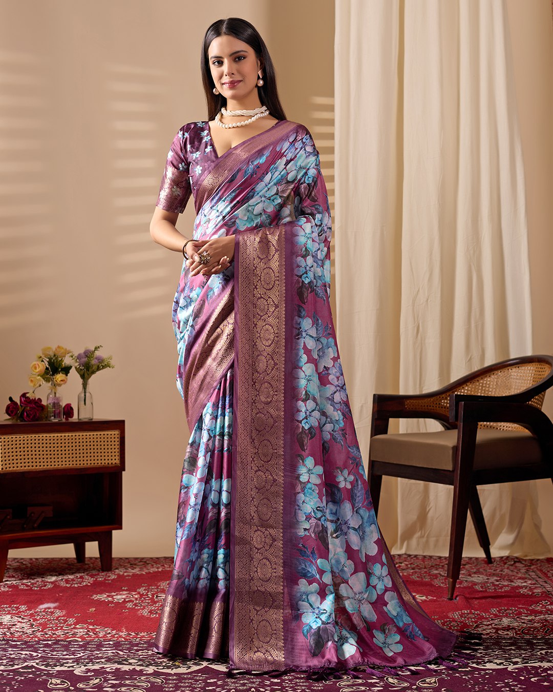 oft Lichi Silk Saree beautifully enhanced with large blooming floral prints and a rich zari woven border.