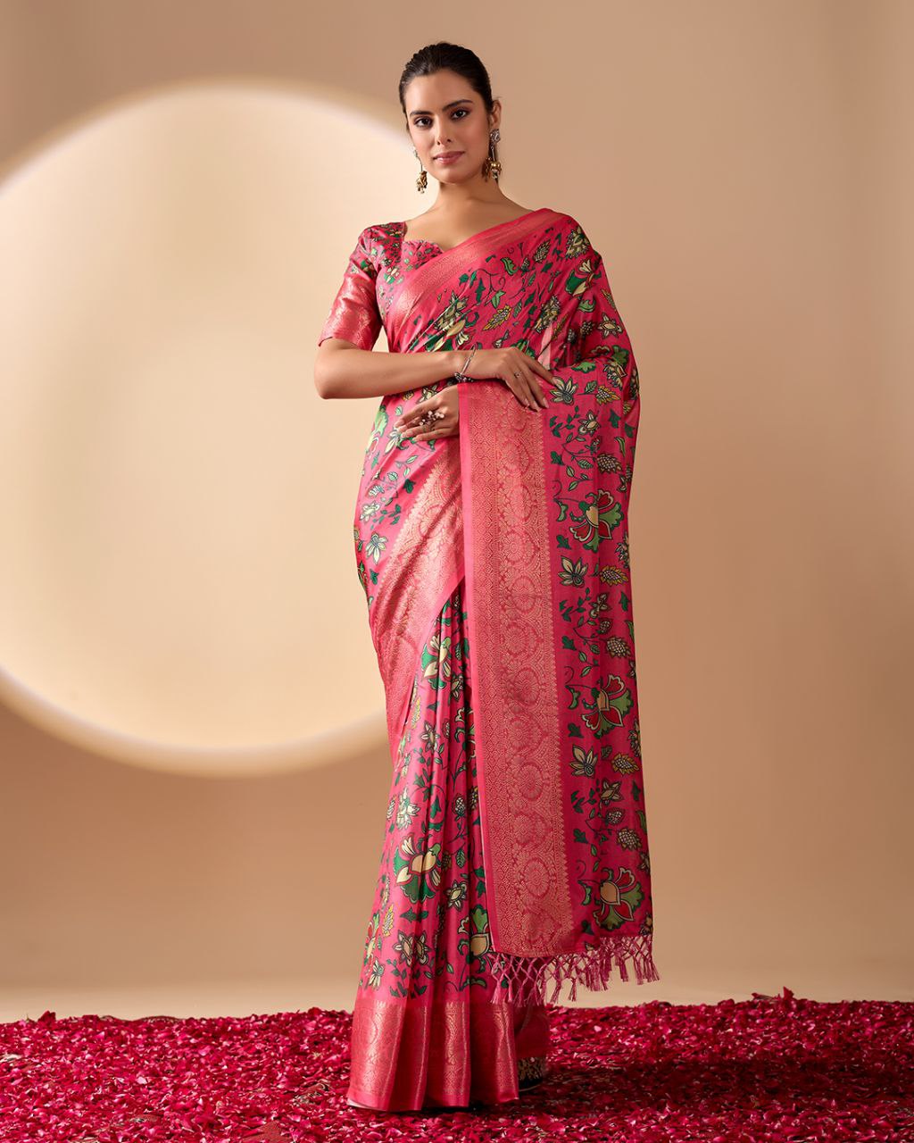 oft Lichi Silk Saree enriched with vibrant floral digital prints and a beautifully woven zari border.