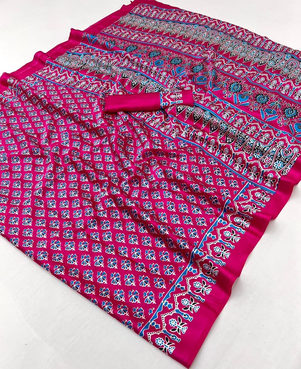 Pure Ajrakh modal satin fabric featuring traditional printed motifs with rich, earthy tones and a soft, breathable feel, perfect for all-day elegance.