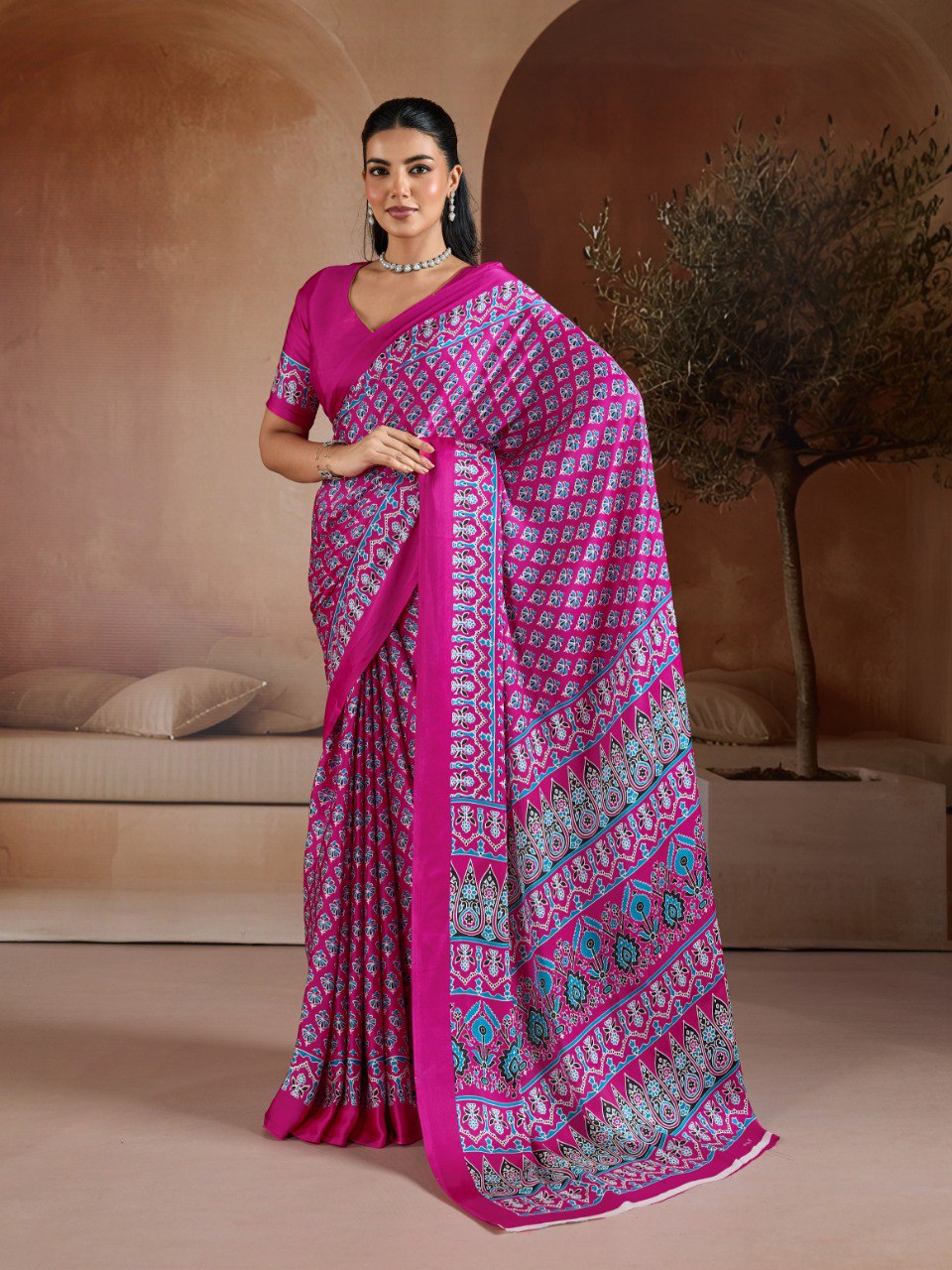 Pure Ajrakh modal satin fabric featuring traditional printed motifs with rich, earthy tones and a soft, breathable feel, perfect for all-day elegance.