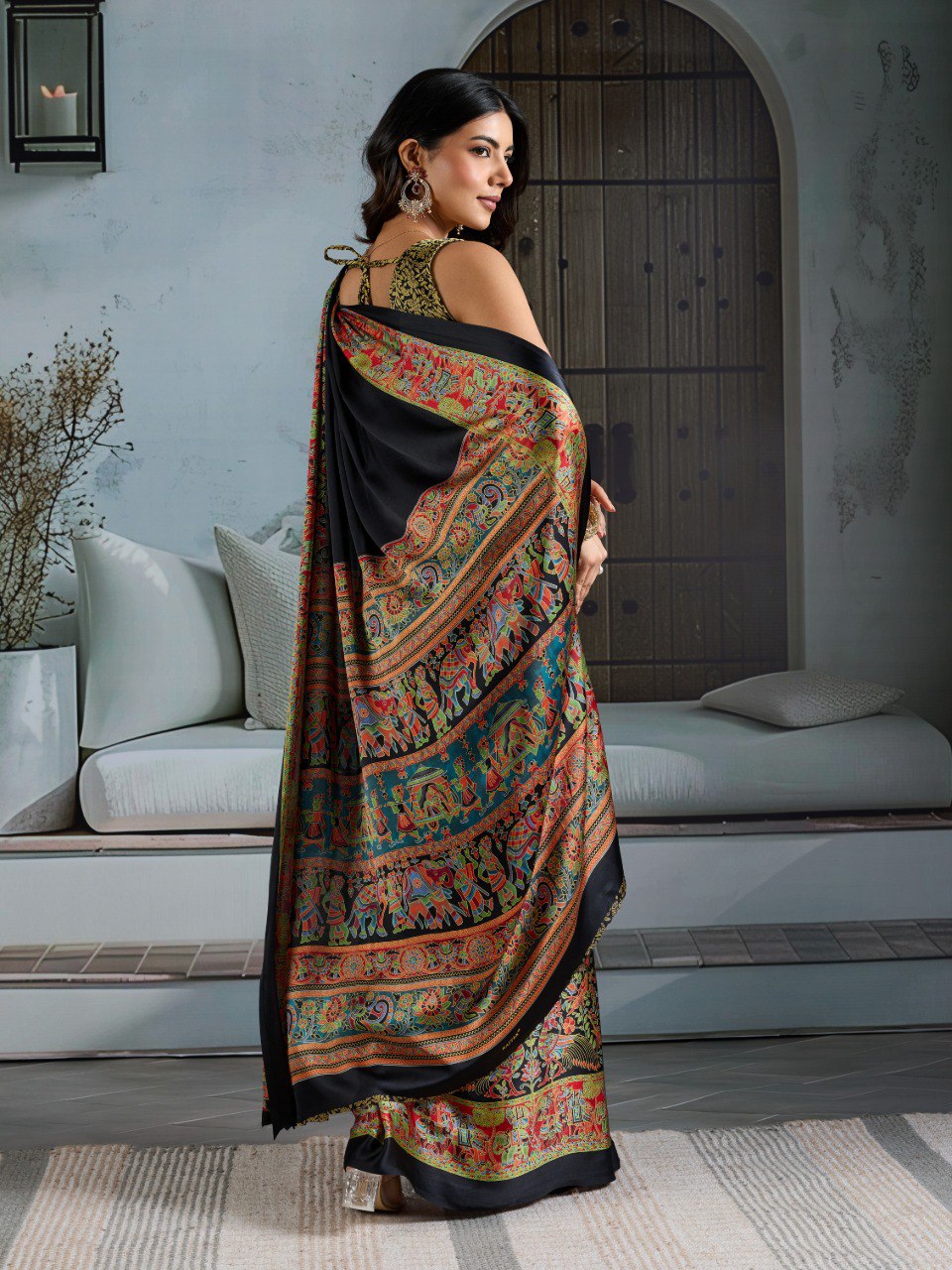 Pure Ajrakh modal satin fabric featuring traditional printed motifs with rich, earthy tones and a soft, breathable feel, perfect for all-day elegance.