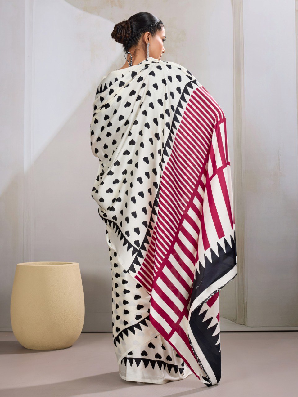 Pure Ajrakh modal satin fabric featuring traditional printed motifs with rich, earthy tones and a soft, breathable feel, perfect for all-day elegance.
