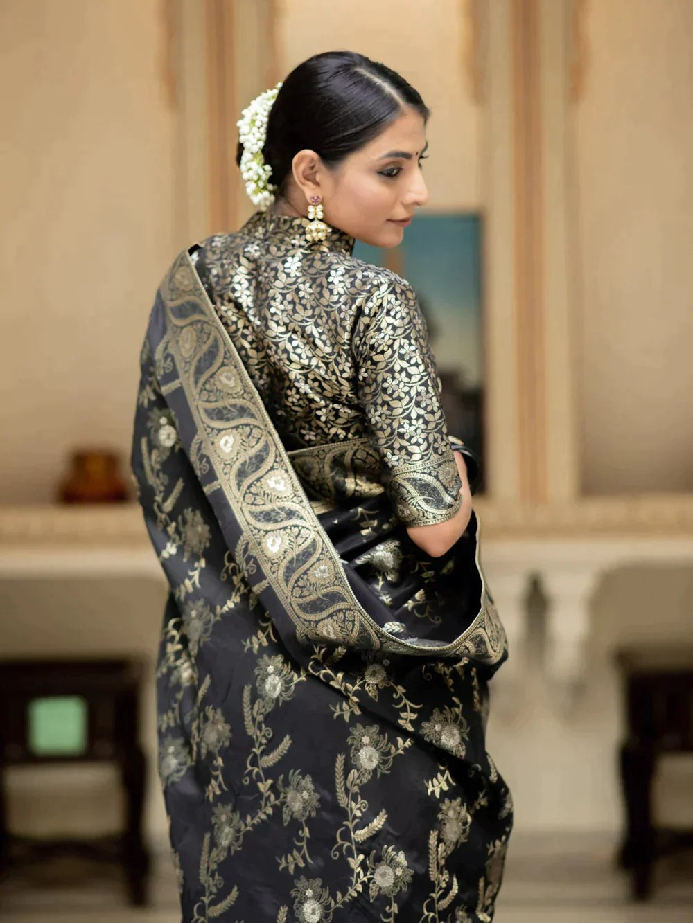 The richly crafted border and opulent pallu showcase traditional Banarasi Silk sarees