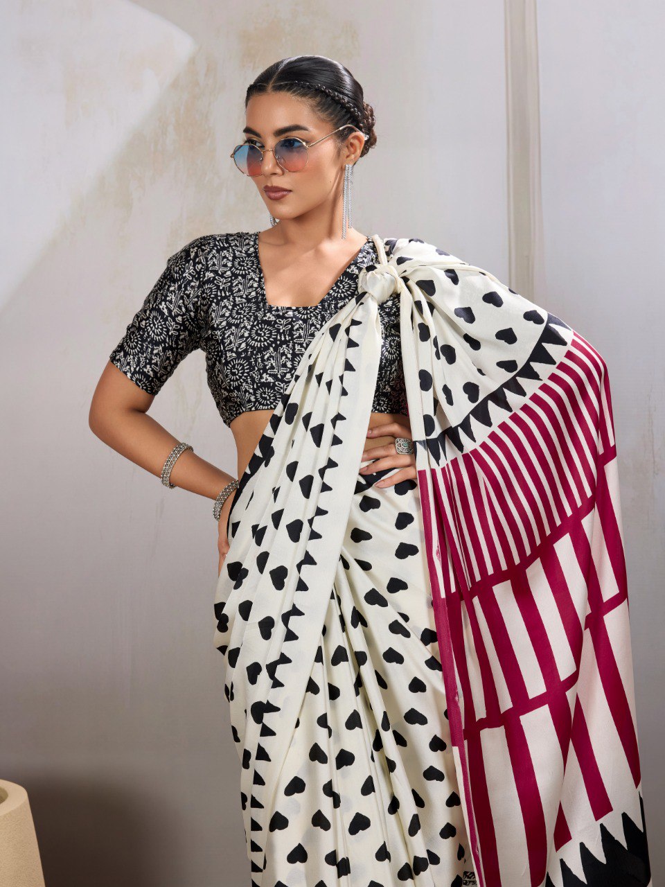 Pure Ajrakh modal satin fabric featuring traditional printed motifs with rich, earthy tones and a soft, breathable feel, perfect for all-day elegance.