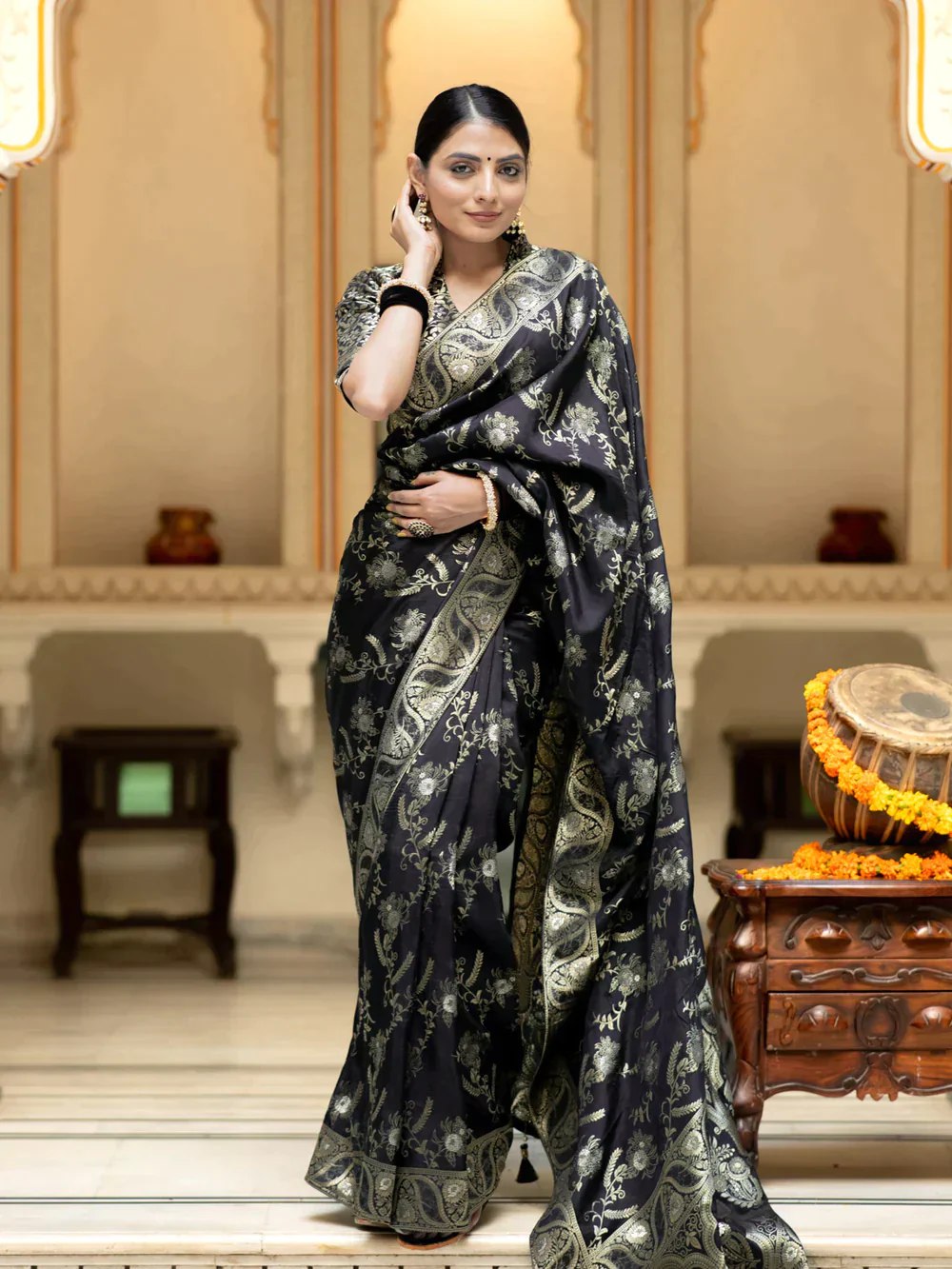 The richly crafted border and opulent pallu showcase traditional Banarasi Silk sarees