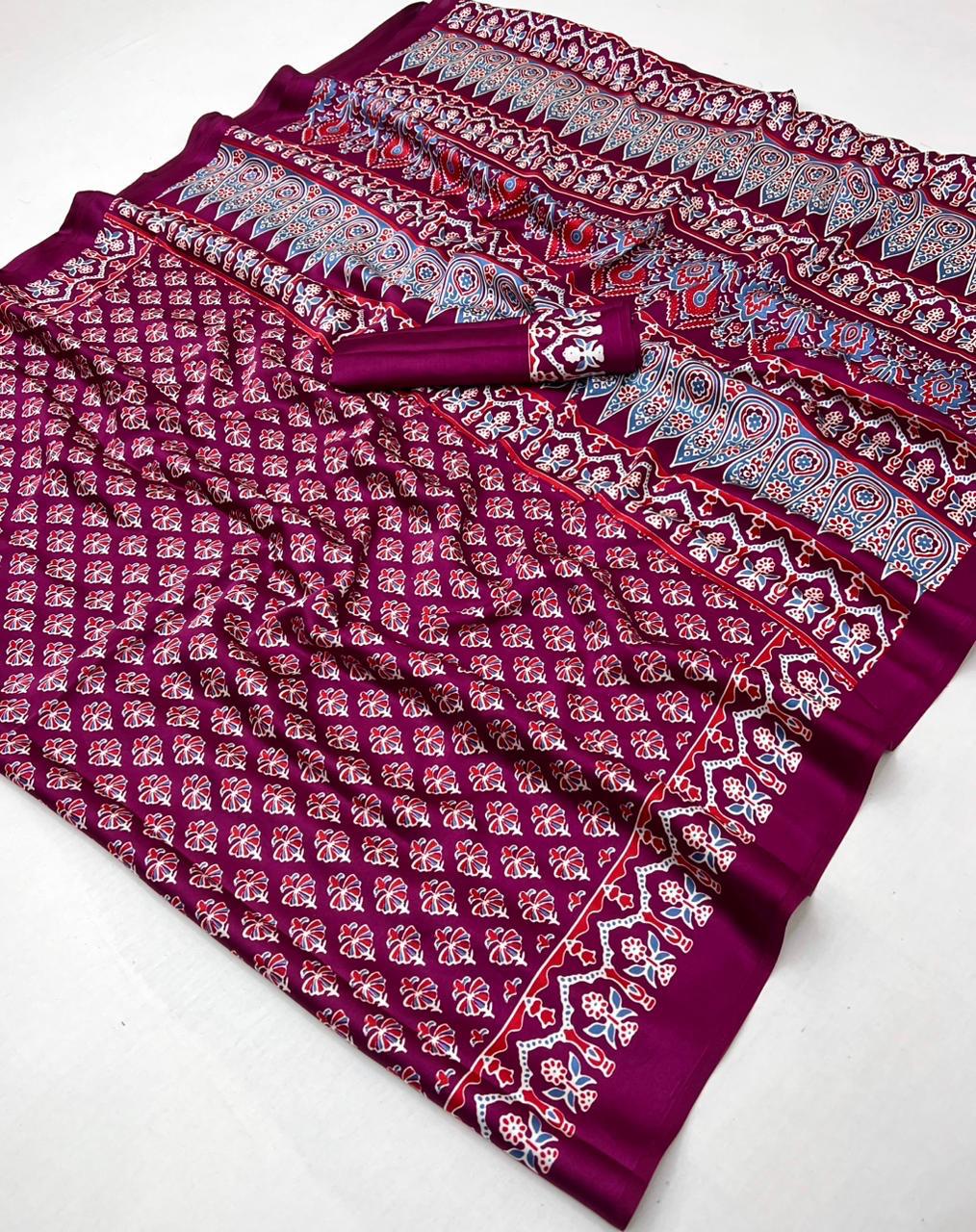 Pure Ajrakh modal satin fabric featuring traditional printed motifs with rich, earthy tones and a soft, breathable feel, perfect for all-day elegance.