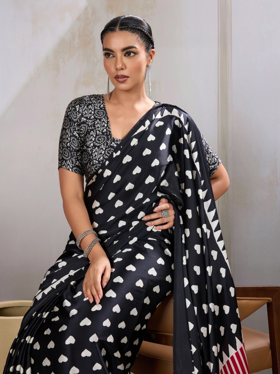 Pure Ajrakh modal satin fabric featuring traditional printed motifs with rich, earthy tones and a soft, breathable feel, perfect for all-day elegance.