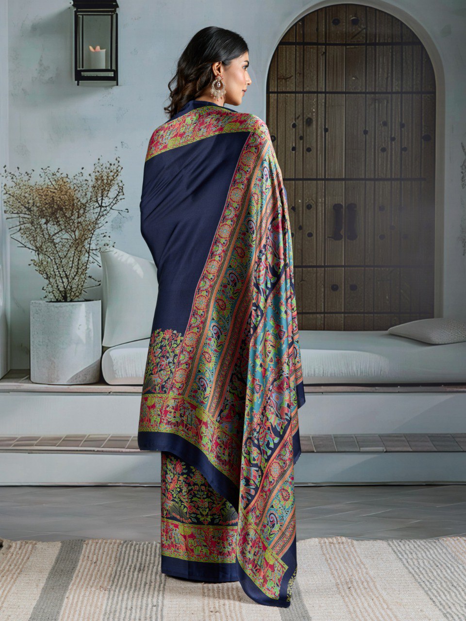 Pure Ajrakh modal satin fabric featuring traditional printed motifs with rich, earthy tones and a soft, breathable feel, perfect for all-day elegance.