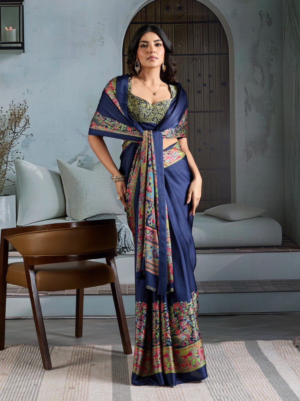 Pure Ajrakh modal satin fabric featuring traditional printed motifs with rich, earthy tones and a soft, breathable feel, perfect for all-day elegance.