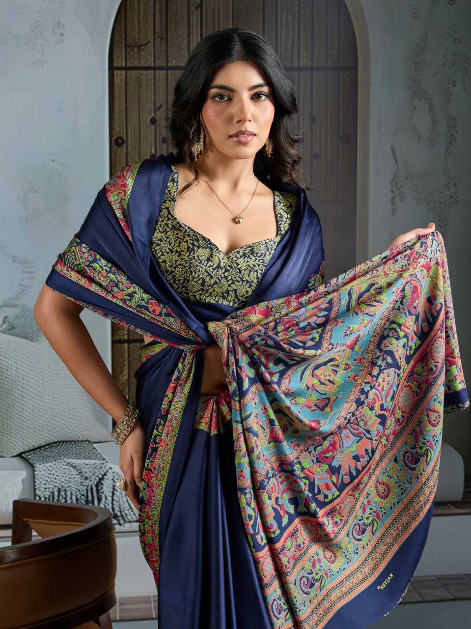 Pure Ajrakh modal satin fabric featuring traditional printed motifs with rich, earthy tones and a soft, breathable feel, perfect for all-day elegance.