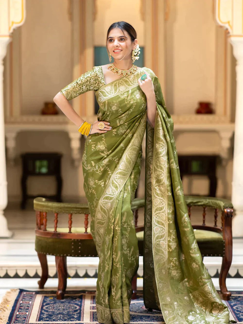 The richly crafted border and opulent pallu showcase traditional Banarasi Silk sarees