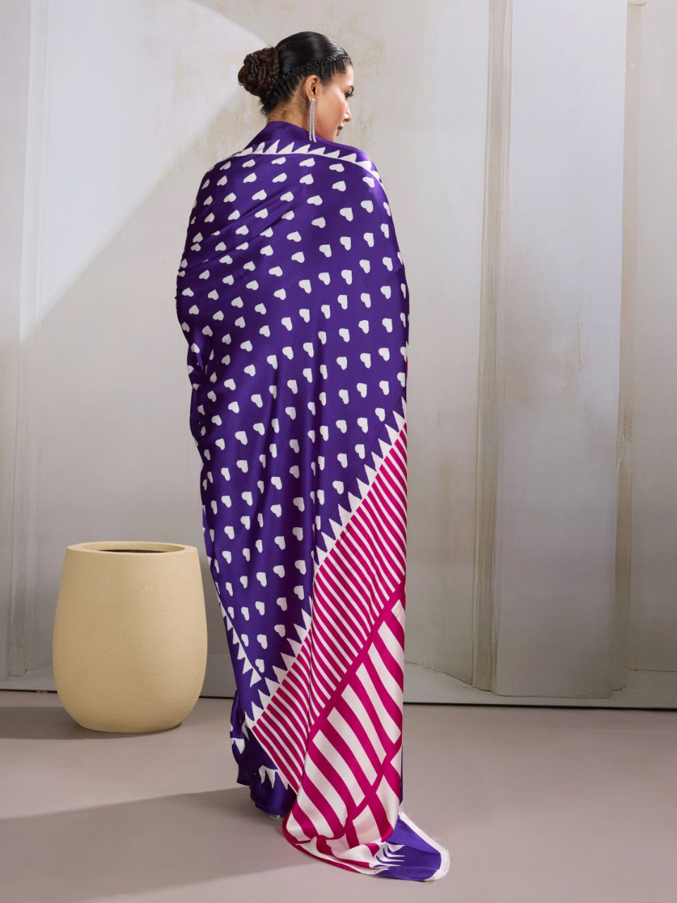 Pure Ajrakh modal satin fabric featuring traditional printed motifs with rich, earthy tones and a soft, breathable feel, perfect for all-day elegance.