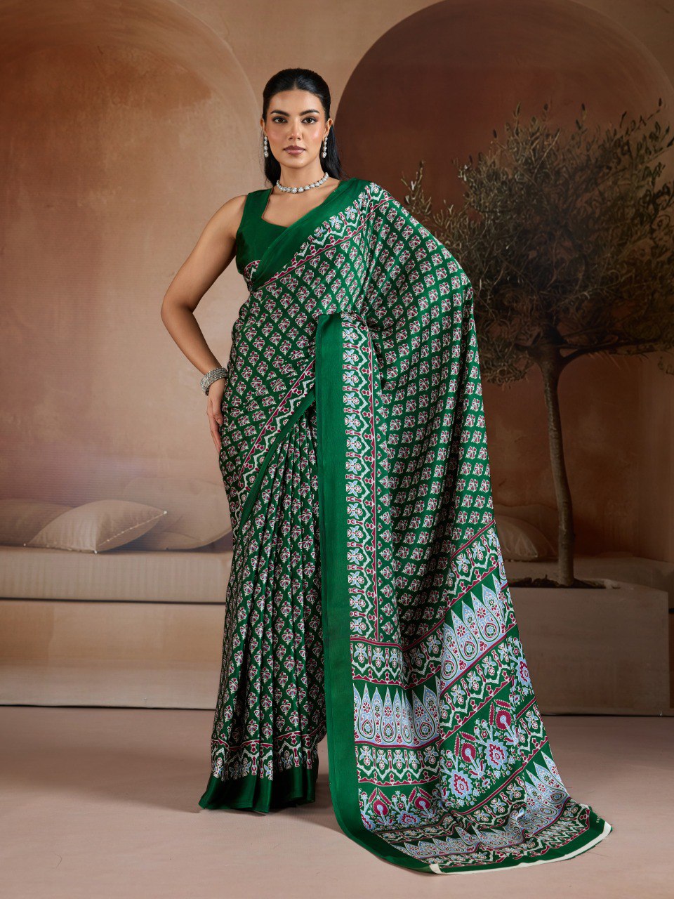 Pure Ajrakh modal satin fabric featuring traditional printed motifs with rich, earthy tones and a soft, breathable feel, perfect for all-day elegance.