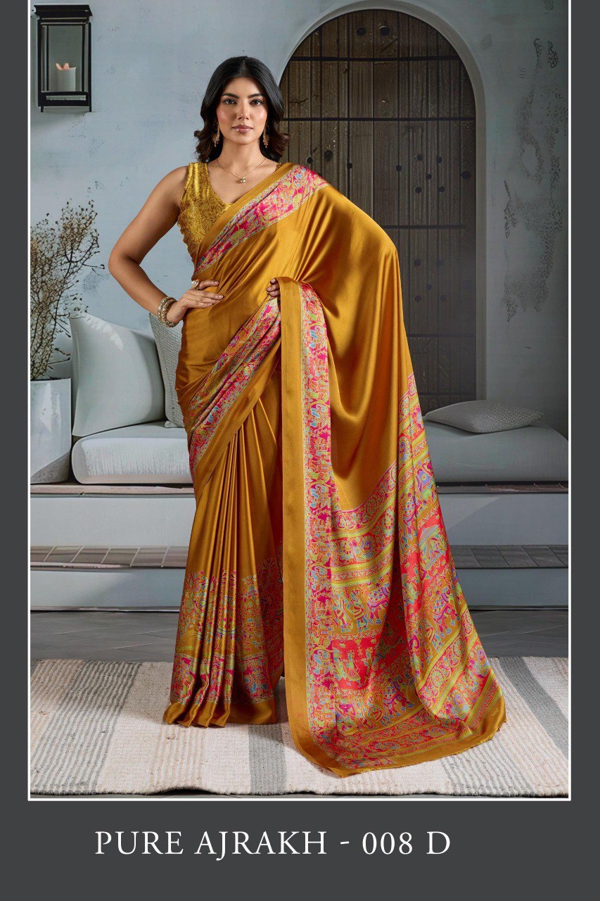 Pure Ajrakh modal satin fabric featuring traditional printed motifs with rich, earthy tones and a soft, breathable feel, perfect for all-day elegance.