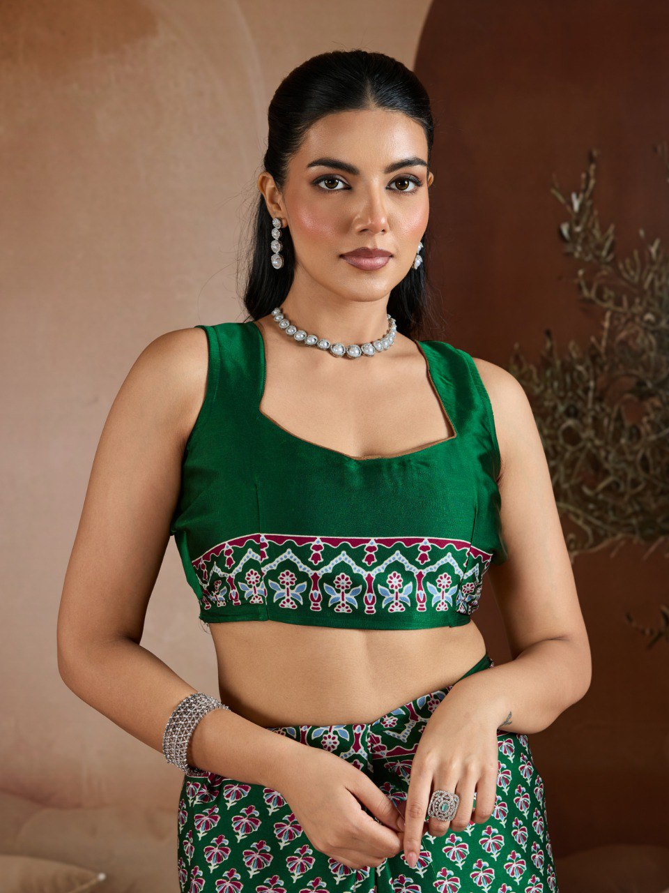 Pure Ajrakh modal satin fabric featuring traditional printed motifs with rich, earthy tones and a soft, breathable feel, perfect for all-day elegance.