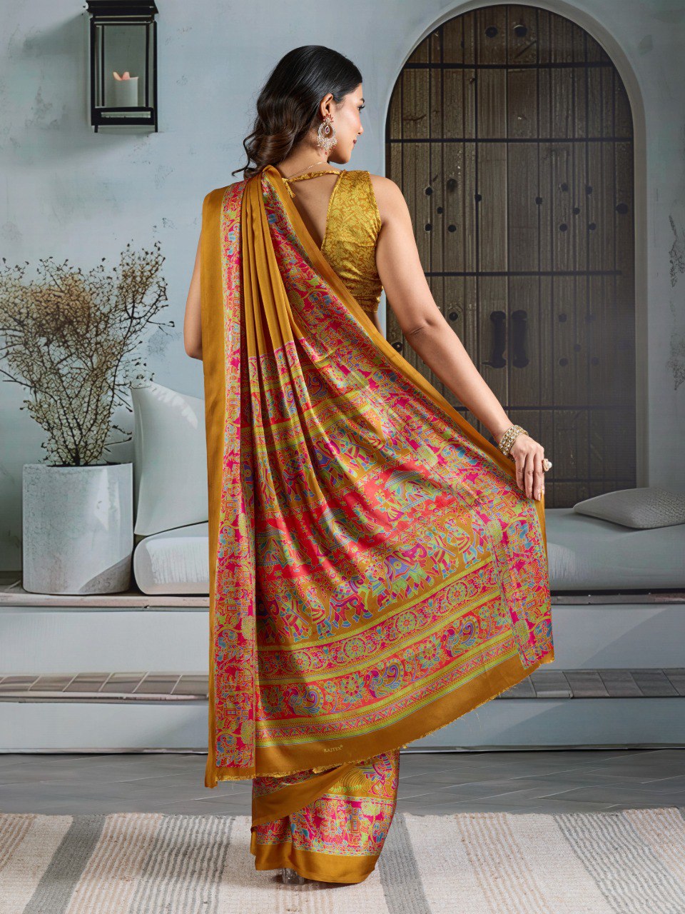Pure Ajrakh modal satin fabric featuring traditional printed motifs with rich, earthy tones and a soft, breathable feel, perfect for all-day elegance.